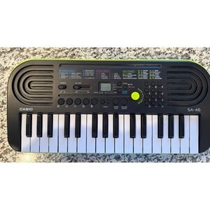 Casio SA-46 32-Key Electronic Keyboard Black Green Speaker Battery Powered Works